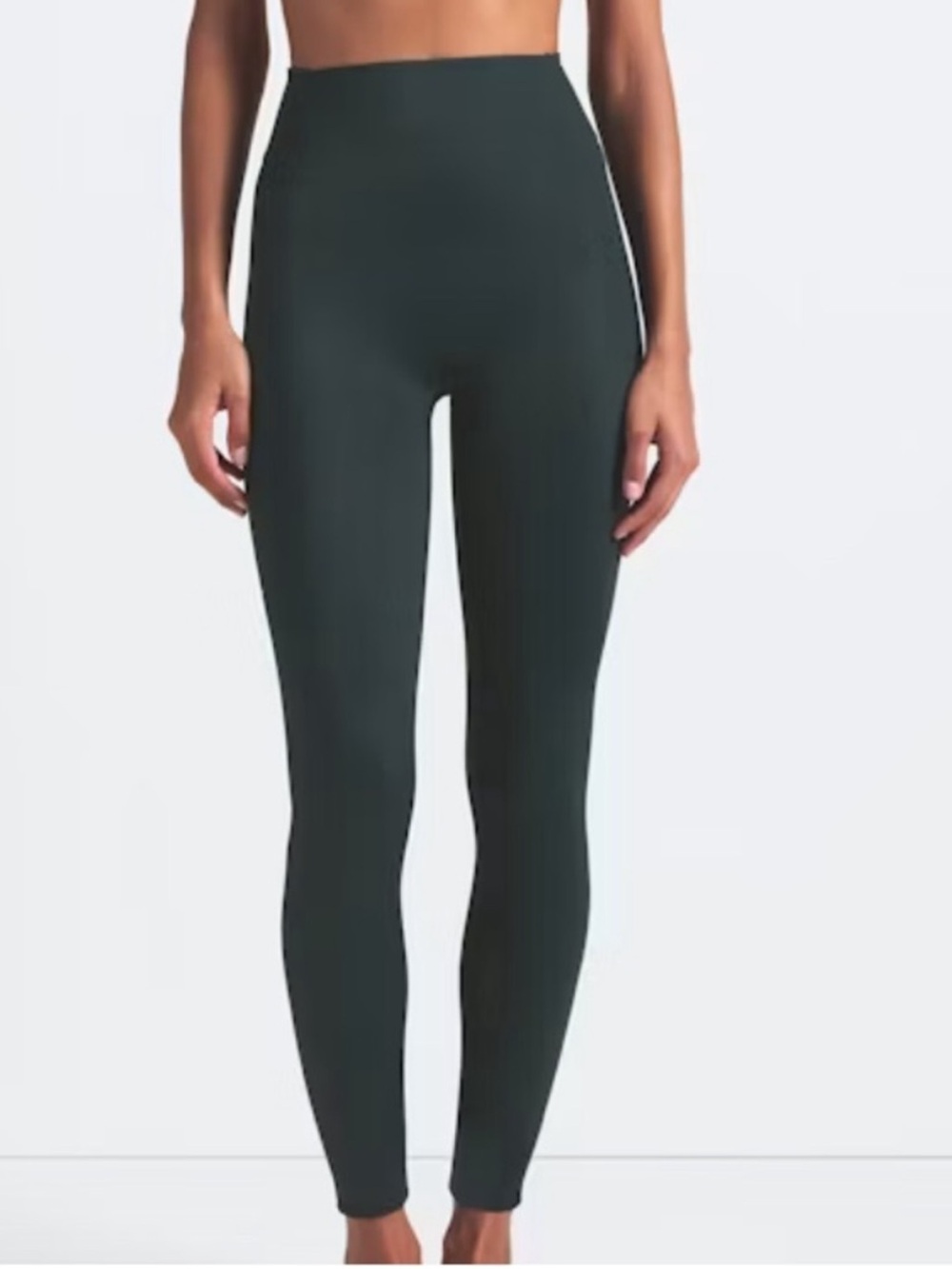 New! Skims medium seamless soft smoothing leggings in cypress color.